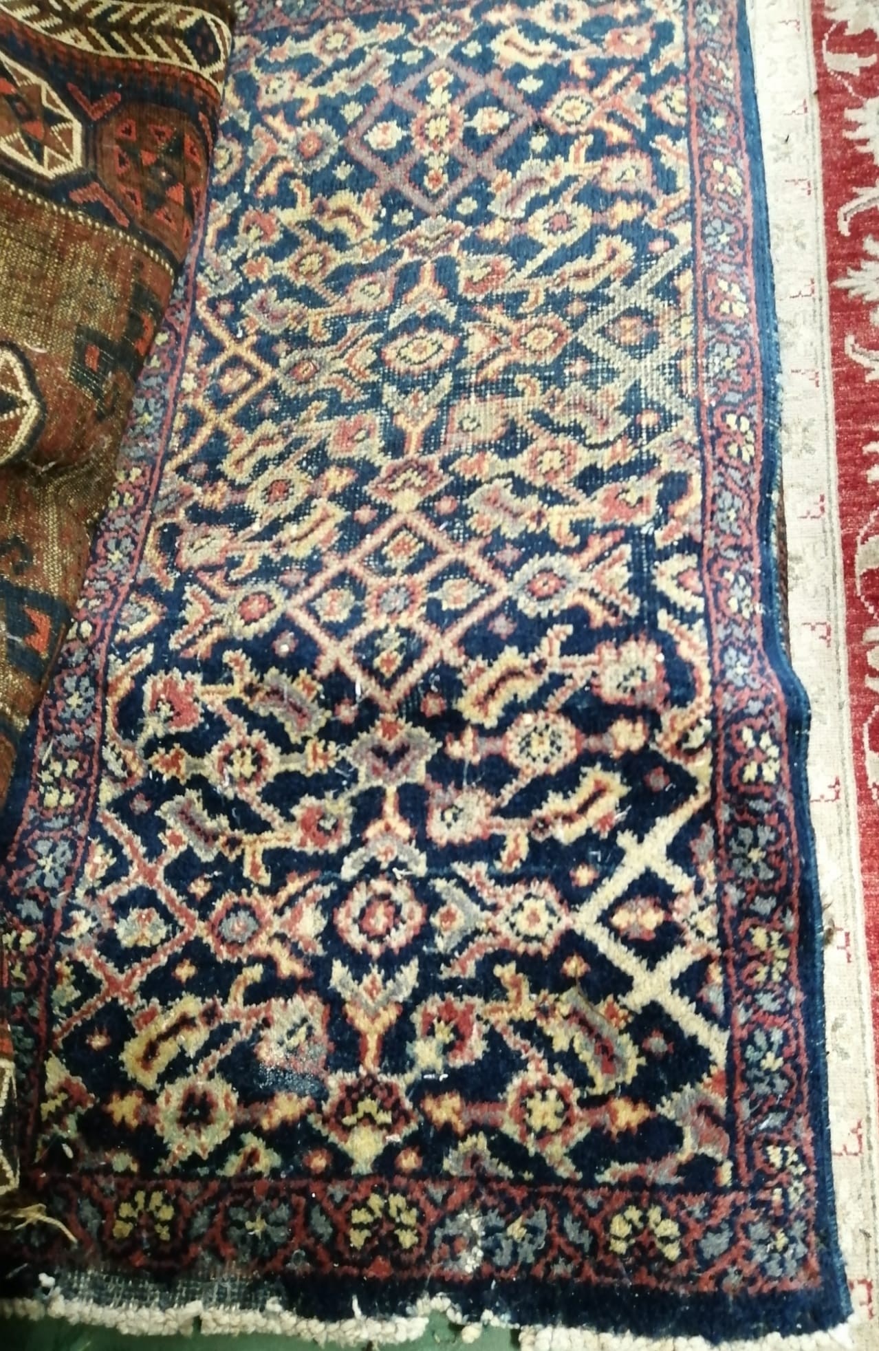 Six antique Belouch bags and faces, largest 200 x 52cm
